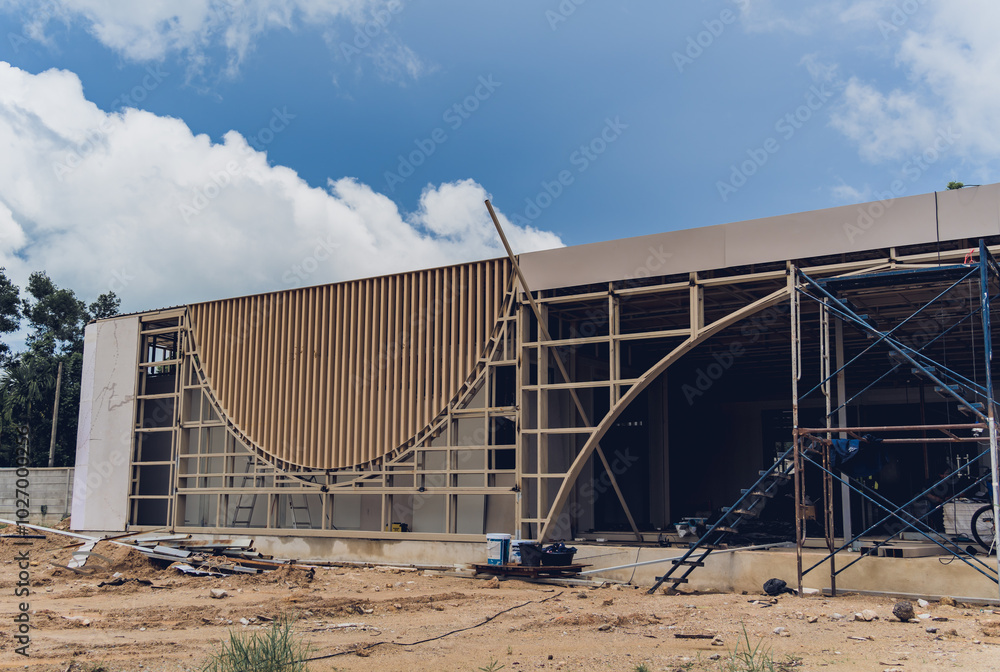 A new modern multi-storey residential building under construction A new modern multi-storey residential building under construction