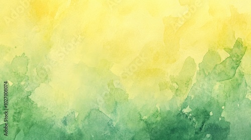 Abstract watercolor background in green and yellow tones.