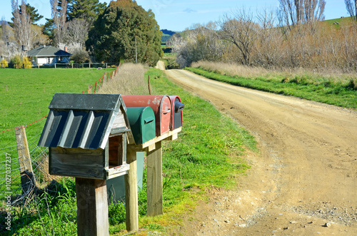 Letterboxes on a dirt farm road, North Canterbury New Zealand. photo