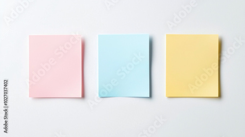 Cute sticky notes in pastel colors on a clean white background for reminders