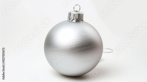 shiny silver Christmas ornament with smooth surface and decorative cap, perfect for holiday decorations and festive celebrations