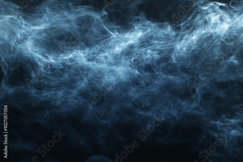 Mysterious wisps of blue smoke swirling against a dark background