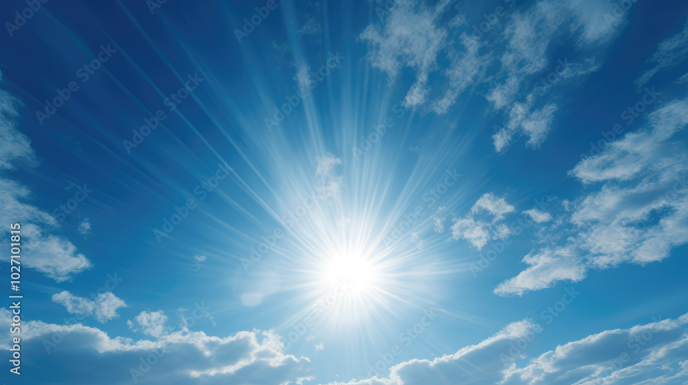 Bright Sunlight Through Blue Sky and Clouds Bright Sunlight Through Blue Sky and Clouds