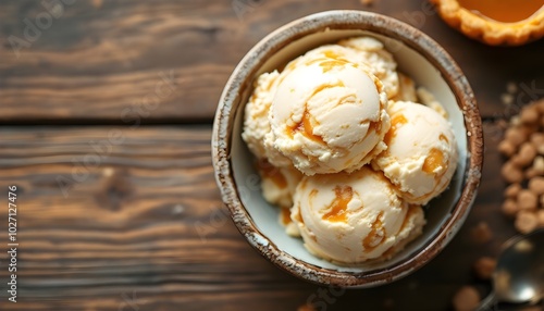 Butter Tart Ice Cream with Caramel Swirls in a Bowl (Canadian Cuisine) photo