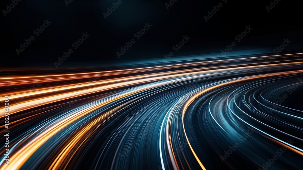 Abstract image of motion blur effects with curved streaks of orange and blue light on a dark background, suggesting speed or movement. Abstract image of motion blur effects with curved streaks of orange and blue light on a dark background, suggesting speed or movement.