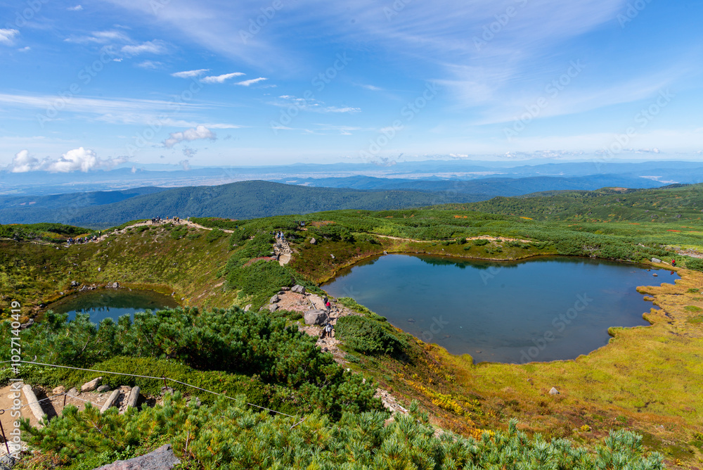 On a clear day, Mount Asahi in Hokkaido, Japan On a clear day, Mount Asahi in Hokkaido, Japan