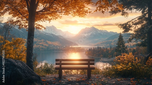 Bench overlooking a tranquil lake with fall foliage and mountain backdrop at sunrise.