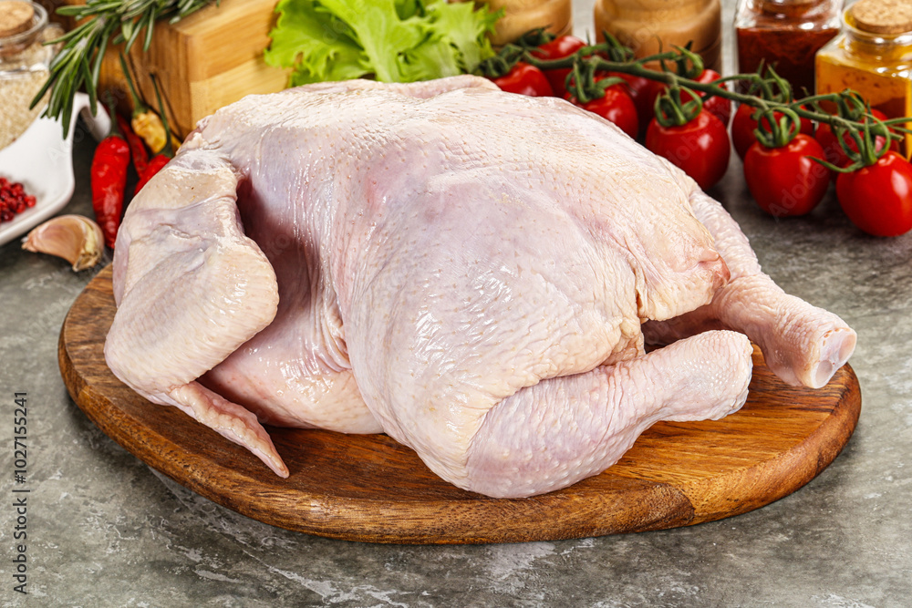 Raw whole chicken for cooking