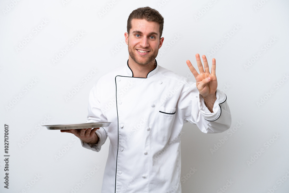 Young caucasian chef with tray isolated on white background happy and counting four with fingers Young caucasian chef with tray isolated on white background happy and counting four with fingers