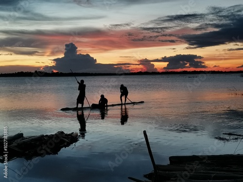 Fishermen on the river photo