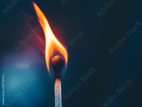 Burning Matchstick Against Dark Background Symbolizing Ignition of Ideas and