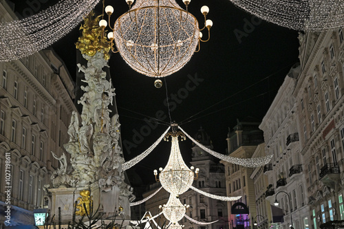 Christmas decoration and lights in Graben shopping street by night in Vienna