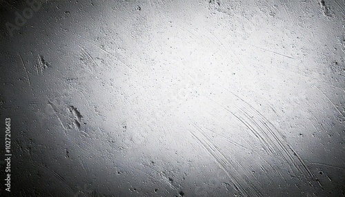 コンクリート 傷跡 テクスチャ 壁面 ざらざら 金属感 照明 表面 光反射 粗さ グレー シンプル デザイン 無機質 模様 パターン 工業的 素材 影 スクラッチ