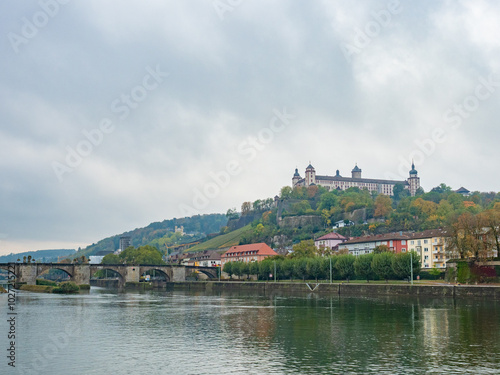 Wuerzburg, Germany - Oktober 19th 2023: View over the Main river towards the historic bridge and the bastion.