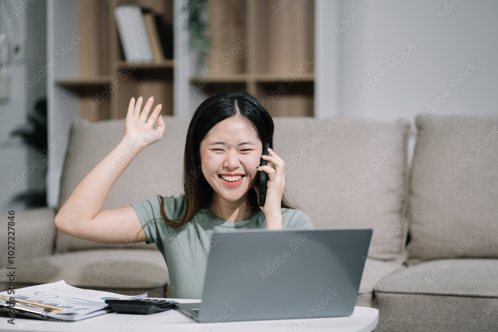 lifestyle Happy woman speaking to mobile phone at home. women speak with remote friend using phone. sitting on sofa. lifestyle Happy woman speaking to mobile phone at home. women speak with remote friend using phone. sitting on sofa.