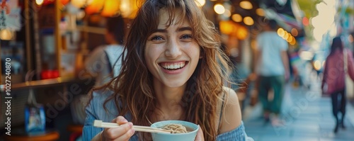 Obraz na płótnie A cheerful woman enjoys a bowl of noodles at a bustling street market, with a backdrop filled with vibrant lights and energy, capturing the essence of street food culture w salonie