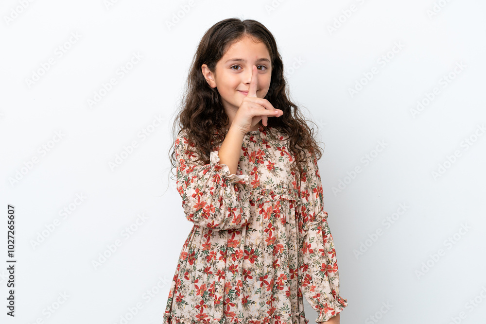 Little caucasian girl isolated on white background showing a sign of silence gesture putting finger in mouth Little caucasian girl isolated on white background showing a sign of silence gesture putting finger in mouth