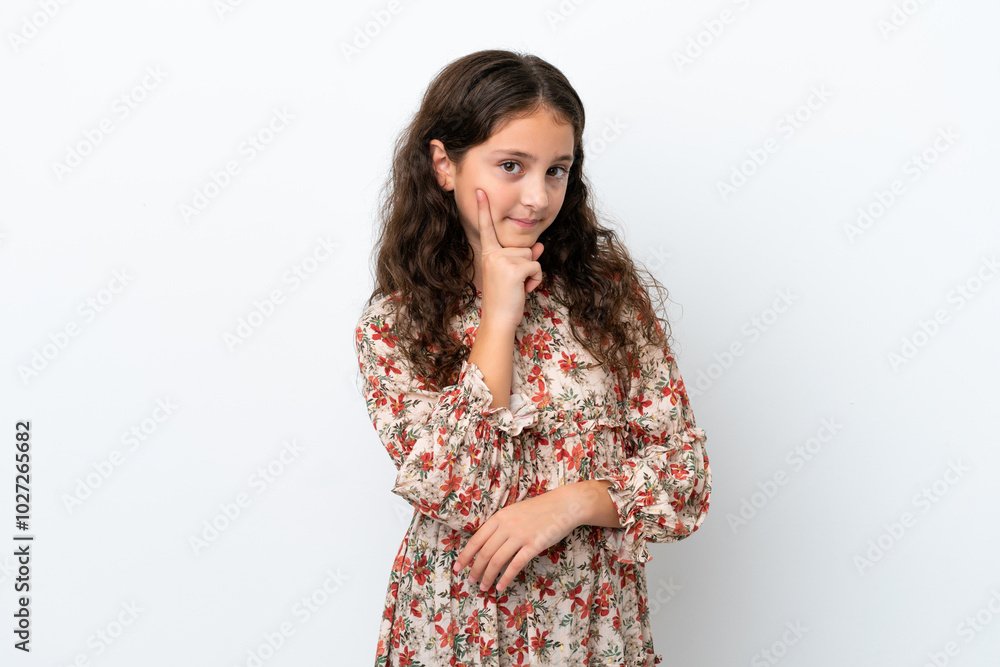 Little caucasian girl isolated on white background and thinking Little caucasian girl isolated on white background and thinking