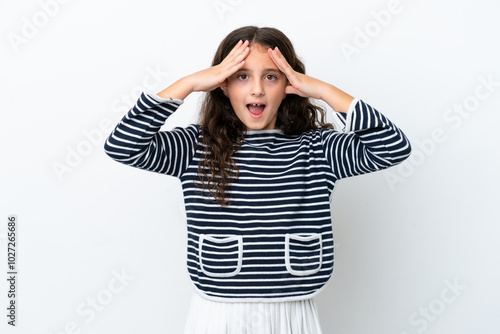 Little caucasian girl isolated on white background with surprise expression