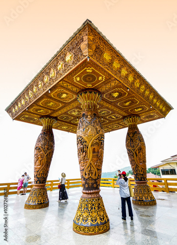 Chiang Mai, Thailand - May 23, 2019: A four-legged table-like structure with 12 Chinese zodiac animals on one side. photo