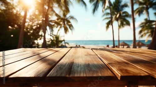 Wooden table with a beach background featuring palm trees, sun umbrellas, and the ocean under a bright and sunny sky.