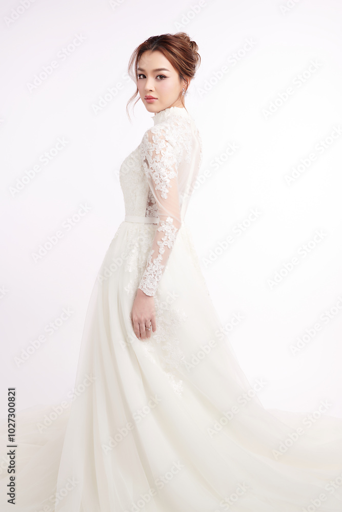 Beautiful young asian woman in wedding dress on white background, Beautiful young asian woman in wedding dress on white background,