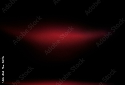 An abstract design with a dark background and a grainy, red gradient.