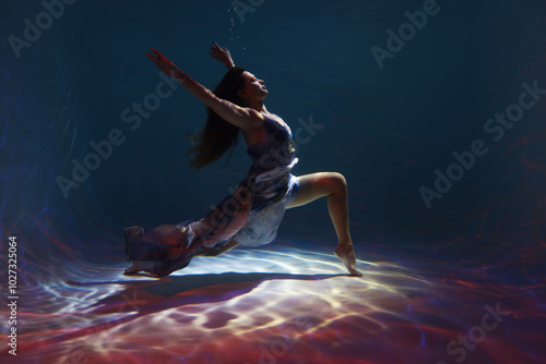 Wallpaper Mural Beautiful woman in dress posing underwater in a swimming pool Torontodigital.ca