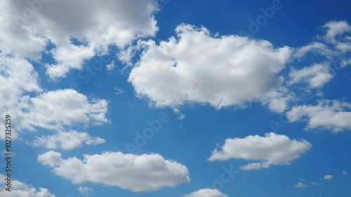 Wallpaper Mural Beautiful white clouds in the sunny blue sky. Volumetric light effect. Convection in the troposphere. Real time slow motion. Cumulus clouds low-level, puffy, cotton-like, fluffy Cumulonimbus Torontodigital.ca