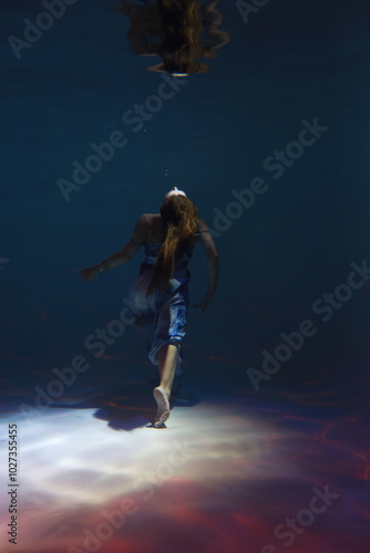 Wallpaper Mural Young woman in dress underwater from back Torontodigital.ca