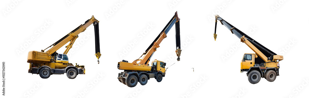 Three yellow construction cranes with black booms against a black background. Three yellow construction cranes with black booms against a black background.
