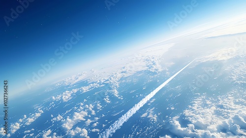 A view of the earth from above the clouds, with several contrails from airplanes streaking across the sky. photo