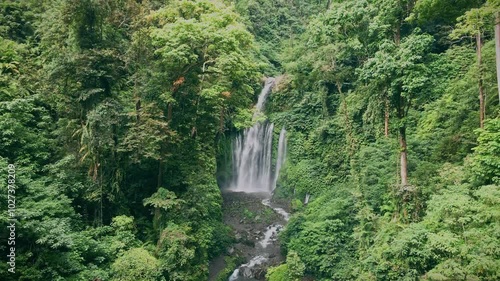 One of the hidden gems of the Lombok Tiu Kelep Waterfalls, Indonesia, the highest and most beautiful waterfall Lombok. photo