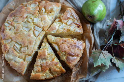 French pear tart or pie with fresh pear fruits photo