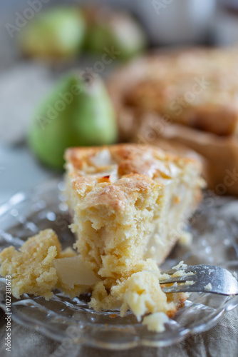 French pear tart or pie with fresh pear fruits photo