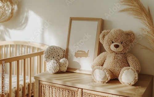 A plush toy sitting in a cabinet alongside a mockup poster, with a cradle in the distance of a baby's nursery.  photo