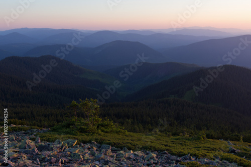 Unique mountain landscapes of the Carpathians. The Gorgany region, a specific part of the Carpathians, is covered with stone deposits. Amazing morning mountain landscape. Golden hour in the Carpathian photo