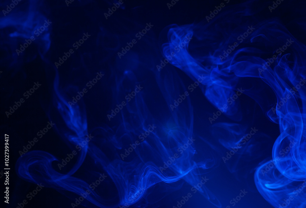 Obraz premium Blue smoke on black background