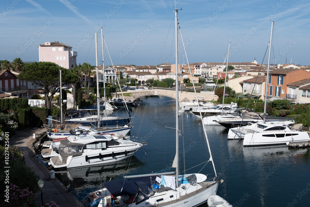Travel and summer vacation destination, view on houses, roofs, canals and boats in Port Grimaud, Var, Provence, French Riviera, France