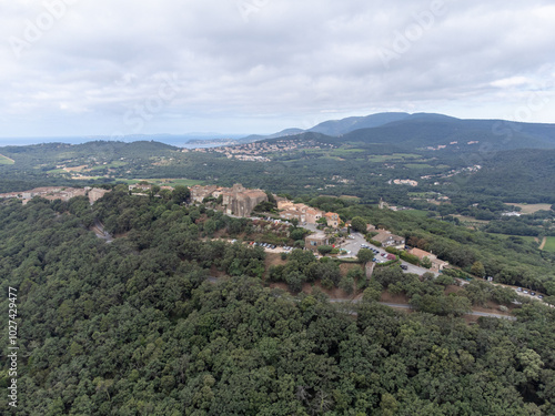 Landscape of French Riviera, view on hills, houses and green vineyards from above Cotes de Provence, production of rose wine near Saint-Tropez and Pampelonne beach, Var, France