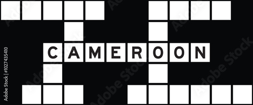 Alphabet letter in word cameroon on crossword puzzle background