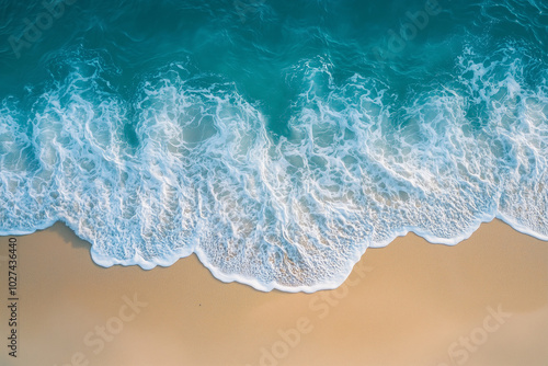 Drone Shot of Ocean Waves Gently Crashing on the Shoreline