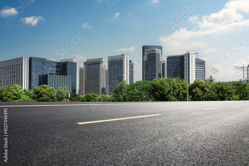 Scenic Urban Landscape Featuring Modern Buildings and Open Road