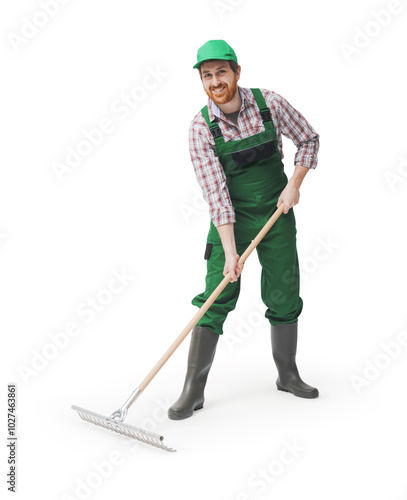 Obraz na płótnie Smiling farmer using a rake