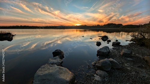 Obraz na płótnie Beautiful orange sunset lakeside landscape scenery at Ballyquirke lough, Galway, Ireland, nature background w salonie