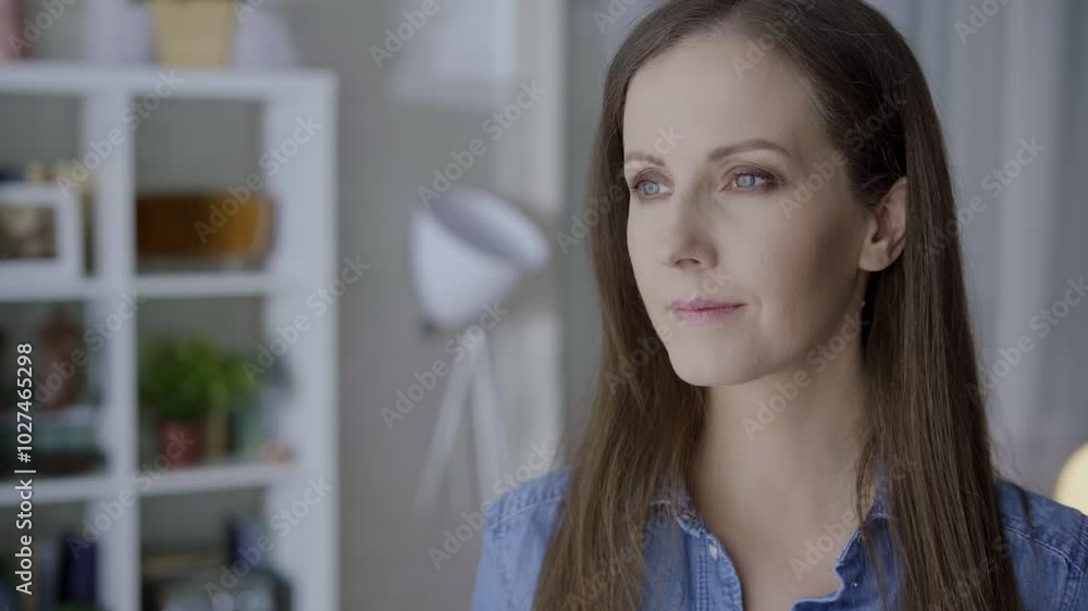Portrait of satisfied white young woman at home, smiling. Portrait of satisfied white young woman at home, smiling.
