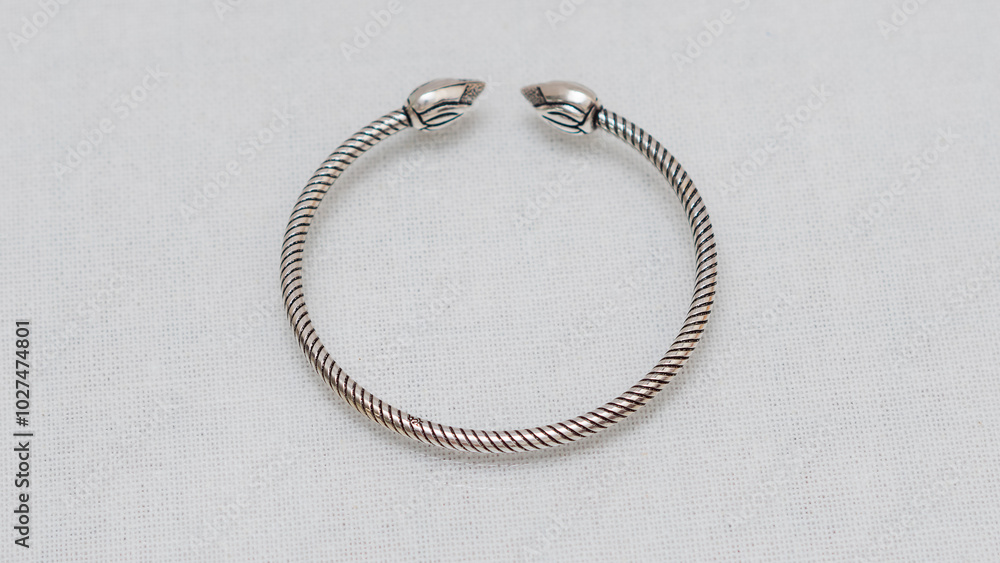 Hmong or Miao handmade silver jewelry on white background Hmong or Miao handmade silver jewelry on white background