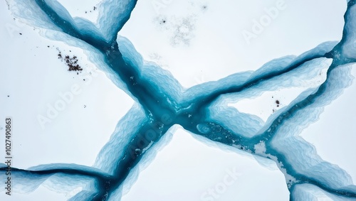 Stunning aerial glacier crevices contrast in blue and white photo