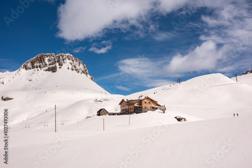 Valokuva Winter mountain landscape with wooden house in Dolomite alps, Italy