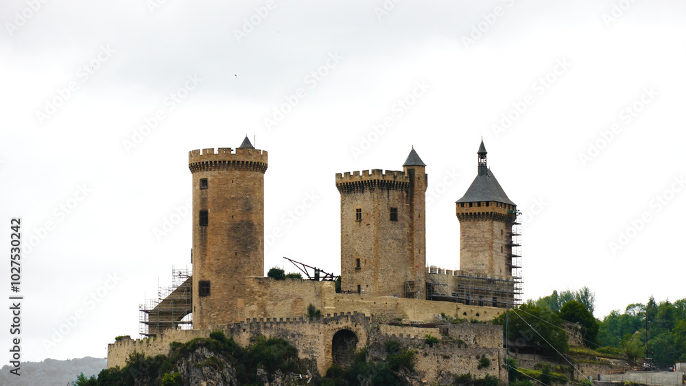 Castle of Foix, located in the French town of Foix at a height of about 60 metres on the top of a limestone crag. Castle of Foix, located in the French town of Foix at a height of about 60 metres on the top of a limestone crag.